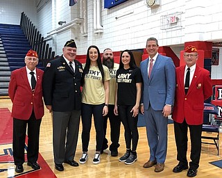 Neighbors | Submitted.Senior Sabrina Hunter posed with military veterans, and Tim Ryan, Hunter's military sponsor Nov. 20 after declaring her intent to attend West Point Military Academy in the fall.