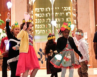 Second graders from Akiva Academy dance to the Maccabee Song during their Hanukkah program at Congregation Rodef Sholom on Thursday evening. EMILY MATTHEWS | THE VINDICATOR