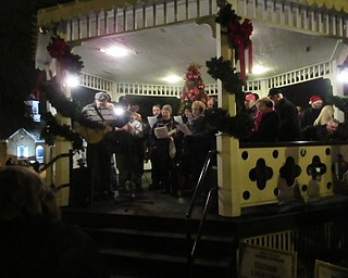 Neighbors | Jessica Harker .The choir from the Presbyterian Church in Canfield sang for community members on Nov. 30 at the Lighting of the Green event.