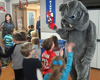 Neighbors | Jessica Harker.Students waved to the Poland Bulldog after singing him "Happy Birthday" during Poland Union's Donut Day on Nov. 30.