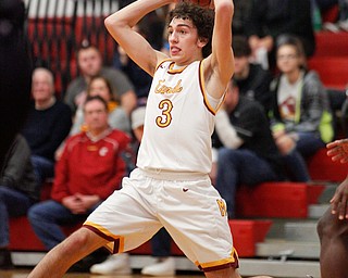 Cardinal Mooney's Sonny Rodriguez passes the ball during the second period of their game against Valley Christian at Cardinal Mooney on Friday night. EMILY MATTHEWS | THE VINDICATOR