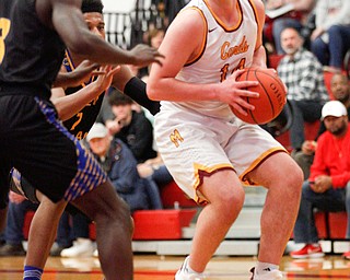 Cardinal Mooney's Mike Pelini tries to get the ball past Valley Christian during the first period of their game at Cardinal Mooney on Friday night. EMILY MATTHEWS | THE VINDICATOR