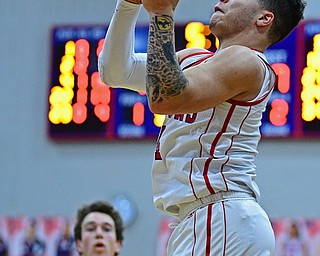 NILES, OHIO - DECEMBER 7, 2018: Niles' Cyler Kane-Johnson goes to the basket after getting behind the Boardman defense during the second half of their game, Friday night at Niles McKinley High School. DAVID DERMER | THE VINDICATOR