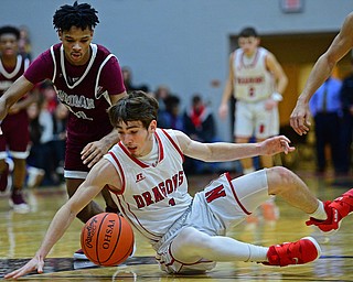 NILES, OHIO - DECEMBER 7, 2018: Niles' Trent Johnson and Boardman's Daeone Martin scramble for a loose ball at mid-court during the second half of their game, Friday night at Niles McKinley High School. DAVID DERMER | THE VINDICATOR