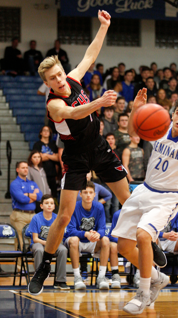 Canfield's Aydin Hanousek keeps the ball in bounds during their game against Poland at Poland Seminary High School on Saturday night. EMILY MATTHEWS | THE VINDICATOR