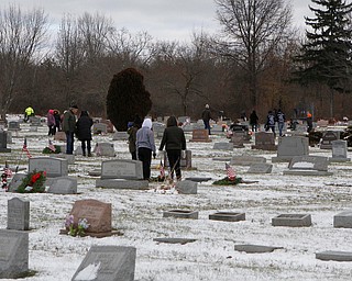 Hundreds of people volunteered to lay wreaths throughout the cemetary to mark gravesites of veterans at the North Jackson Cemetary on Saturday morning. Dustin Livesay  |  The Vindicator  12/8/18  North Jackson