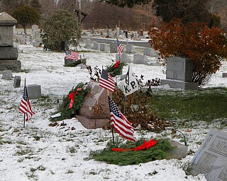 The graves of fallen veteran are marked with a wreath to show respect for their service at the North Jackson Cemetary on Saturday morning. Dustin Livesay  |  The Vindicator  12/8/18  North Jackson