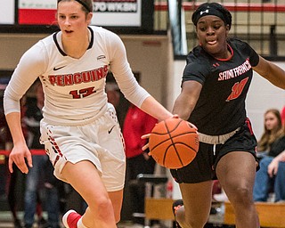 DIANNA OATRIDGE | THE VINDICATOR  St. Francis' Leah Morrow (10) goes for the steal as Youngstown State's Chelsea Olson (12) dribbles downcourt during their game at Beeghly Center on Saturday.