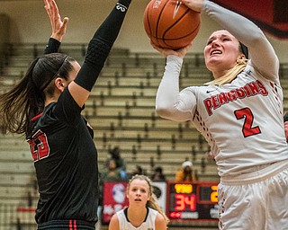 DIANNA OATRIDGE | THE VINDICATOR  Youngstown State's Alison Smolinski (2) puts up shot over St. Francis defender Jess Kovatch (23) during their game at Beeghly Center on Saturday.