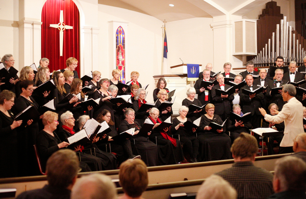 The Stambaugh Chorus performs under the direction of Dr. Hae-Jong Lee as part of the Concerts Under the Dome at First Presbyterian Church in Columbiana on Sunday night. EMILY MATTHEWS | THE VINDICATOR