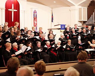 The Stambaugh Chorus performs under the direction of Dr. Hae-Jong Lee as part of the Concerts Under the Dome at First Presbyterian Church in Columbiana on Sunday night. EMILY MATTHEWS | THE VINDICATOR