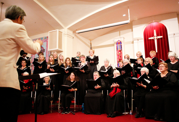 The Stambaugh Chorus performs Cantate Domino under the direction of Dr. Hae-Jong Lee as part of the Concerts Under the Dome at First Presbyterian Church in Columbiana on Sunday night. EMILY MATTHEWS | THE VINDICATOR