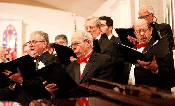 The Stambaugh Chorus performs O Holy Night as part of the Concerts Under the Dome at First Presbyterian Church in Columbiana on Sunday night. EMILY MATTHEWS | THE VINDICATOR