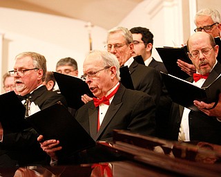 The Stambaugh Chorus performs O Holy Night as part of the Concerts Under the Dome at First Presbyterian Church in Columbiana on Sunday night. EMILY MATTHEWS | THE VINDICATOR