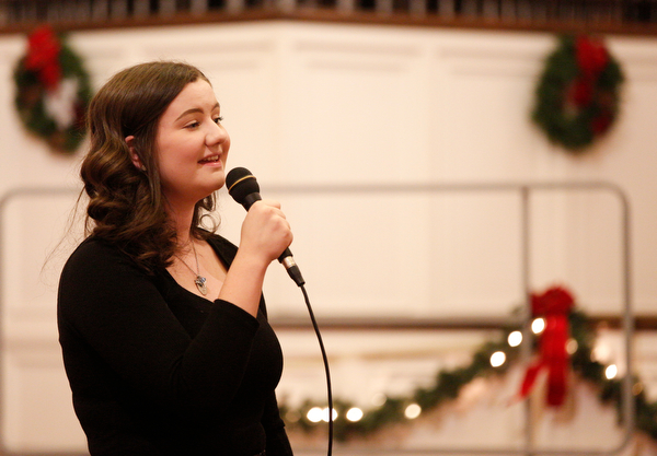 Ava Wilson, a high school sophomore from Poland, sings The First Noel as part of the Concerts Under the Dome at First Presbyterian Church in Columbiana on Sunday night. EMILY MATTHEWS | THE VINDICATOR