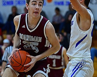 CORTLAND, OHIO - DECEMBER 11, 2018: Boardman's Ethan Anderson drives on Lakeview's Jeff Remmick during the first half of their game, Tuesday night at Lakeview High School. DAVID DERMER | THE VINDICATOR