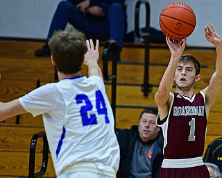 CORTLAND, OHIO - DECEMBER 11, 2018: Boardman's Tommy Fryda shoots over Lakeview's Dawson Brown during the first half of their game, Tuesday night at Lakeview High School. DAVID DERMER | THE VINDICATOR