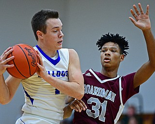 CORTLAND, OHIO - DECEMBER 11, 2018: Lakeview's Daniel Evans grabs a rebound away from Boardman's Daeone Martin during the first half of their game, Tuesday night at Lakeview High School. DAVID DERMER | THE VINDICATOR