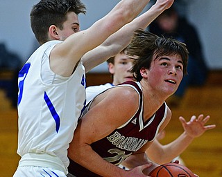 CORTLAND, OHIO - DECEMBER 11, 2018: Boardman's Cam Kreps attempts to put up a shot over Lakeview's Carter Huff during the first half of their game, Tuesday night at Lakeview High School. DAVID DERMER | THE VINDICATOR