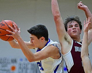 CORTLAND, OHIO - DECEMBER 11, 2018: Lakeview's Jeff Remmick grabs a rebound away from Boardman's Cam Kreps during the first half of their game, Tuesday night at Lakeview High School. DAVID DERMER | THE VINDICATOR