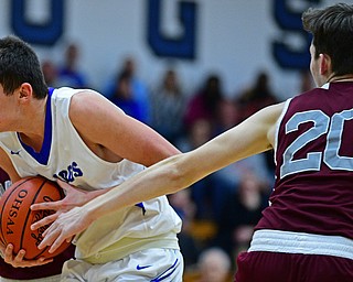 CORTLAND, OHIO - DECEMBER 11, 2018: Lakeview's Jeff Remmick drives on Boardman's Shay Eicher during the second half of their game, Tuesday night at Lakeview High School. DAVID DERMER | THE VINDICATOR