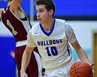 CORTLAND, OHIO - DECEMBER 11, 2018: Lakeview's AJ McClellan dribbles away from Boardman's Tommy Fryda during the second half of their game, Tuesday night at Lakeview High School. DAVID DERMER | THE VINDICATOR