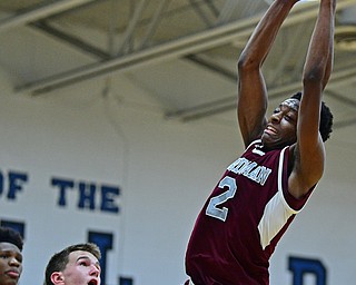 CORTLAND, OHIO - DECEMBER 11, 2018: Boardman's Che Trevena grabs the ball away from a Lakeview defender during the second half of their game, Tuesday night at Lakeview High School. DAVID DERMER | THE VINDICATOR