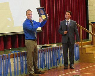 Neighbors | Jessica Harker.Principal Mike Zoccali held the school's National Blue Ribbon award on Nov. 16 during Stadium Drive's award celebration ceremony.