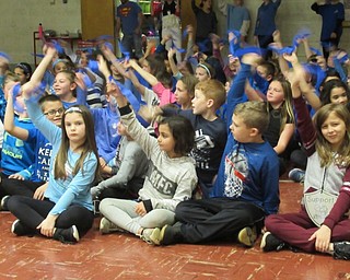 Neighbors | Jessica Harker.Students at Stadium Drive Elementary all held blue streamers to wave in celebration of recieving the national blue ribbon award Nov. 16.