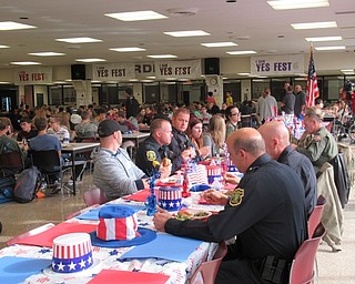 Neighbors | Jessica Harker.Veterans and active duty military members sat at the head of the Boardman lunch room at a decorated table Nov. 12 for the schools annual veterans day luncheon.