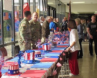 Neighbors | Jessica Harker.Students and staff members at Boardman High School greeted veterans as they visited the school.