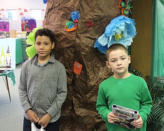 Neighbors | Abby Slanker.Two C.H. Campbell Elementary School students showed off their purchases after shopping at the school’s annual book fair on Nov. 14.