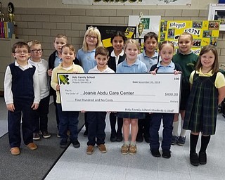 Neighbors | Submitted.Holy Family students recently presented a check to The Joanie Abdu Care Center for breast cancer research. Students pictured are, from left, (front) Giorgio Restaino, Madden Rivera, Beni Perrotta, Nina Hughes, Isabelle Damelio, Chloe Kuzma; (back) Camden Pitzer, Justin Gentile, Addison Shotts, Monica Skurich, Greggory Hann and Maria Balogh.