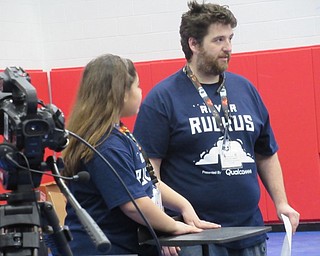 Neighbors | Jessica Harker .Members of the Austintown robotics team prepared for the first tournament of the year Dec. 1, hosted at Austintown Middle School.