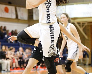 McDonald's Sophia Costantino shoots towards the hoop during their game against Mineral Ridge at McDonald High School on Thursday night. EMILY MATTHEWS | THE VINDICATOR