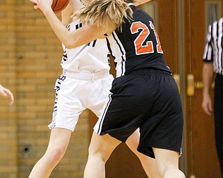 McDonald's Maddy Howard tries to block Mineral Ridge's Noelle Bukovina from passing the ball during their game at McDonald High School on Thursday night. EMILY MATTHEWS | THE VINDICATOR