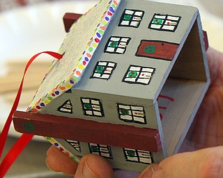 William D. Lewis The vindicator  Wooden gingerbread house ornaments being made by CH Campbell 2nd graders