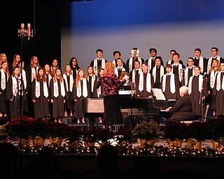 Neighbors | Abby Slanker.Under the direction of Canfield High School choir director Kelly Scurich, the concert choir performed holiday songs for family and friends at the choral music department’s annual winter concert on Dec. 6.