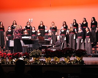 Neighbors | Abby Slanker.The Canfield High School One Octave Higher choir performed “Alleluia Rejoice” at the choral music department’s annual winter concert.