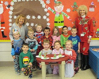 Neighbors | Jessica Harker.Joy Bucci and her class shared the holiday spirit during their Polar Express Day where students dressed in Pajamas and created holiday crafts, starting off the day with milk and cookies.