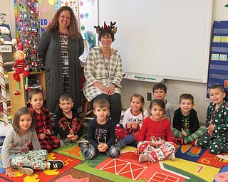 Neighbors | Jessica Harker .Preschool teacher Terry Wittenaur and her class celebrated the holiday season with a Polar Express day where students read holiday books and created bells to prove they believe in Santa Claus.