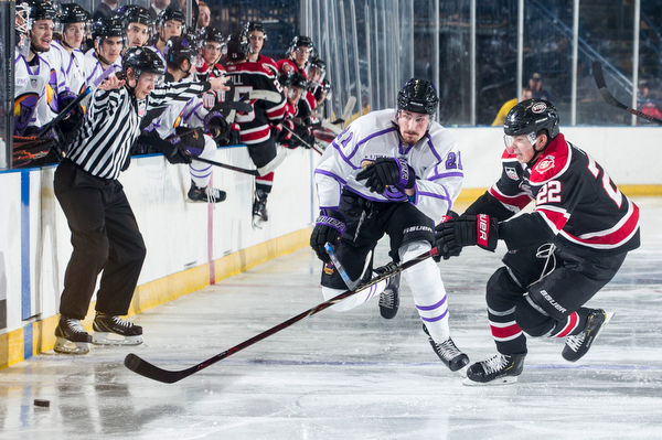 Scott R. Galvin | The Vindicator.Youngstown Phantoms forward Brett Murray (21) skates past Chicago Steel defenseman Owen Power (22) for the puck during the second period at the Covelli Centre on Saturday, Dec. 15, 2018.