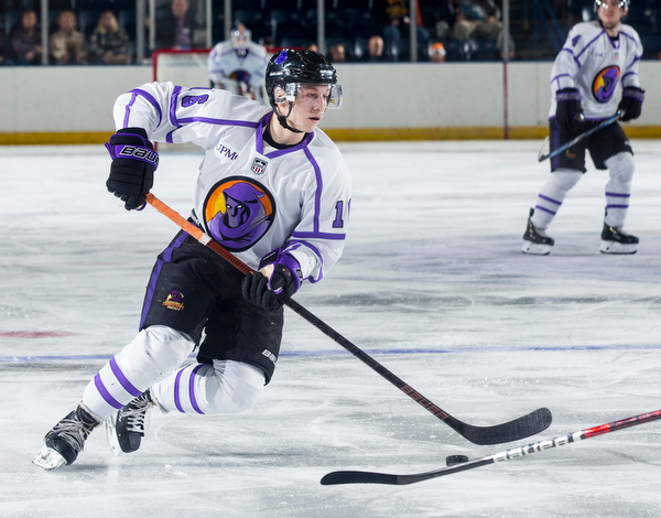 Scott R. Galvin | The Vindicator.Youngstown Phantoms forward Trevor Kuntar (16) skates the puck to the net for a shot against the Chicago Steel during the second period at the Covelli Centre on Saturday, Dec. 15, 2018.