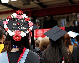 Kristen Kukura waits to receive her diploma for her Master of Science in Education for counseling during YSU's commencement ceremony in Beeghly Center on Sunday afternoon. EMILY MATTHEWS | THE VINDICATOR