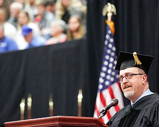 Commencement speaker Marc Malandro speaks during YSU's commencement ceremony in Beeghly Center on Sunday afternoon. EMILY MATTHEWS | THE VINDICATOR
