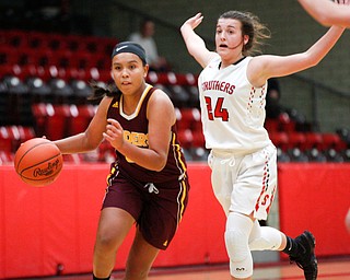 South Range's Lexi Giles dribbles the ball while Struthers' Kaylei Shaffer tries to block her during their game at Struthers on Monday night. EMILY MATTHEWS | THE VINDICATOR