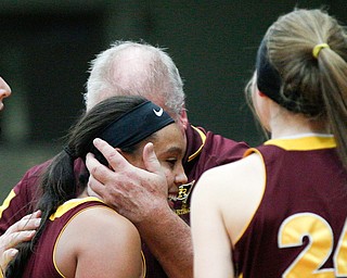 South Range Head Coach Tony Matisi hugs Lexi Giles after she scores against Struthers during their game at Struthers on Monday night. EMILY MATTHEWS | THE VINDICATOR