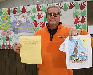 ROBERT K.YOSAY  | THE VINDICATOR..UAW  1112   David Green talks about the thousands of letters the union has received in support of not closing the plant that will be sent to mary barra   GM CEO....Tim O'Hara  shows of f the hand written notes