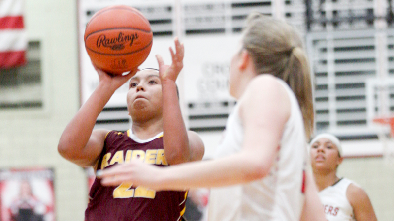 South Range's Lexi Giles shoots and scores against Struthers during their game at Struthers on Monday night. 
