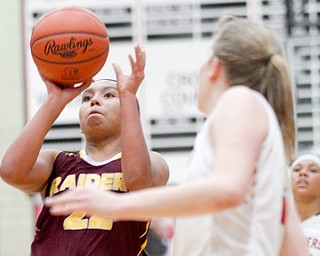 South Range's Lexi Giles shoots and scores against Struthers during their game at Struthers on Monday night. 